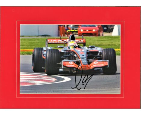 Motor Racing Lewis Hamilton signed 10 x 8 colour photo. Mounted to 16 x 12 overall size. In action in his Mclaren days. Lewis