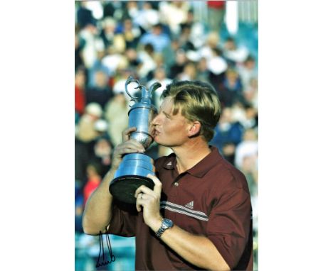 Golf Ernie Els 12x8 signed colour photo pictured celebrating with Open Championship claret jug. Theodore Ernest Els (born 17 