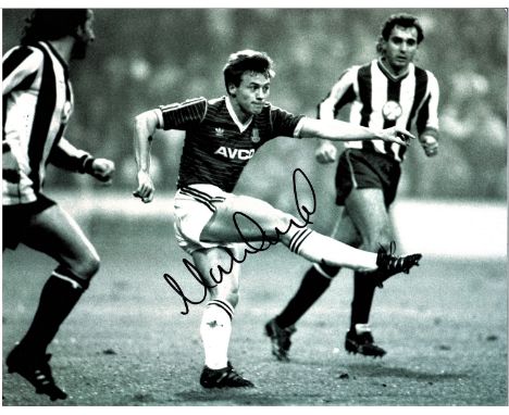 Football Mark Ward 10x8 signed b/w photo pictured playing for West Ham United. Ward was signed by West Ham United manager Joh