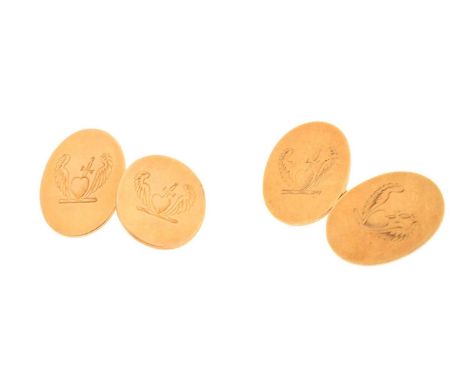 Pair of 18ct gold cufflinks, each oval link having engraved decoration of a heart pierced by a dagger between a pair of wings