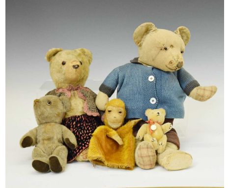 Early 20th century straw filled golden mohair teddy bear with glass eye, 39cm high, together with another teddy bear, miniatu