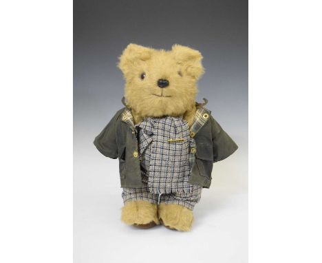 Wellwood Weavers &amp; Crafts golden mohair 'Barbour' teddy bear, complete with scarf, dungarees and green waxed jacket, 43cm