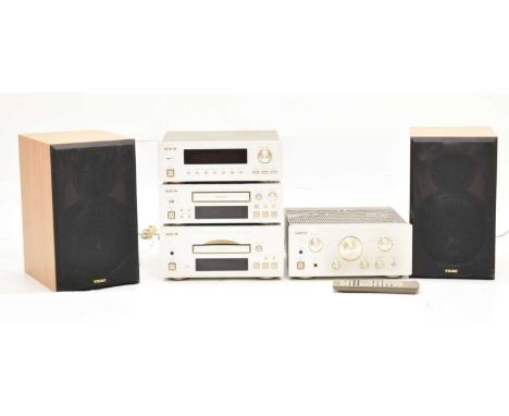 TEAC A-H500 amplifier, together with a PD-H500 Compact Disc Player, R-H500 Auto Reverse Stereo Cassert Deck, T_H500 FM/AM Dig