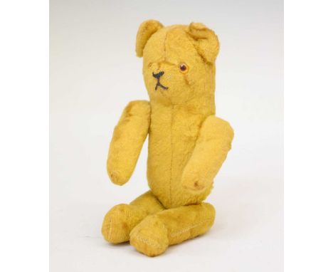 Miniature mohair teddy bear, with jointed limbs and glass eyes, 17cm high