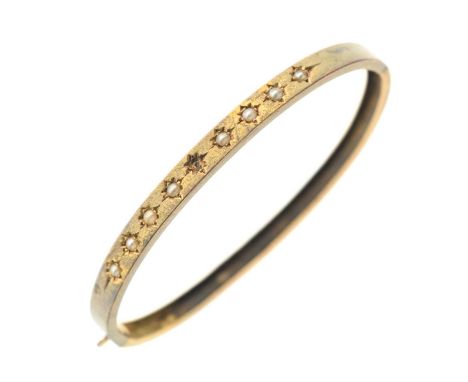 Unmarked yellow metal and seed pearl bangle, 8.8g gross approx (a/f)
