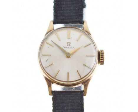 Omega - Lady's 9ct gold cased cocktail watch, having a silvered dial with applied gilt baton hour markers and gilt hands, sig
