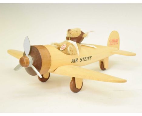 Steiff - Small 12cm high teddy bear pilot with wooden 'Air Steiff' model plane, 34cm