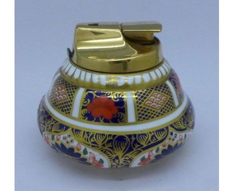 A Royal Crown Derby Imari table lighter, damaged, a/f