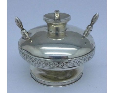 A silver table cigar lighter, Birmingham 1913, with inscription, To The Mess of 5th Bn. M.G.C. Major B. McEwen 21.10.16, 114g