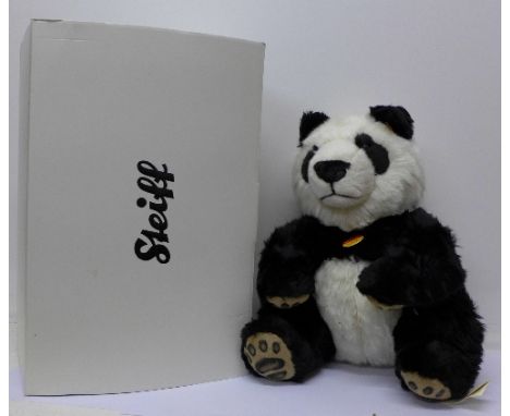 A Steiff panda, boxed