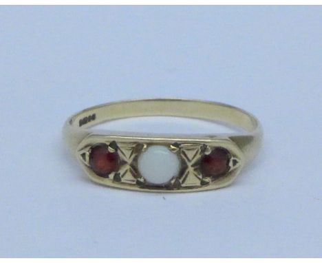 A 9ct gold, opal and garnet ring, 1.7g, P