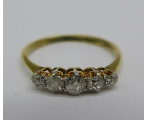 An 18ct gold and platinum set five stone diamond ring, 2.4g, Q