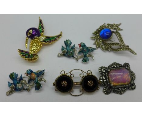 Six brooches including two enamel bird brooches