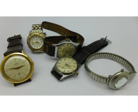 A Rotary wristwatch, a Roamer wristwatch and three others