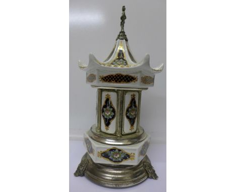 A musical cigarette dispenser