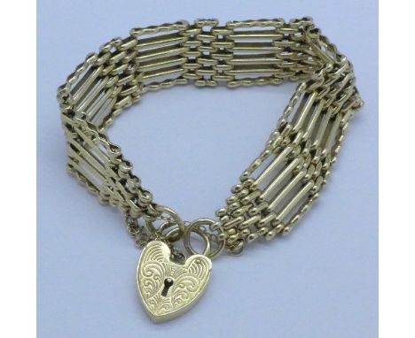 A 1970's 9ct gold gate bracelet, 28.1g