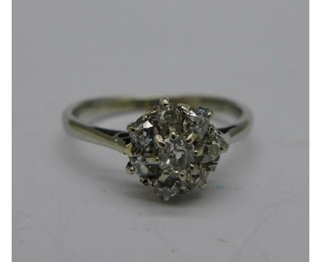 An 18ct white gold diamond cluster ring, 1.8g, K