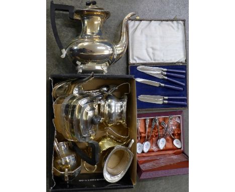 A Viners three plated tea service, a plated teapot, a silver plated cream and sugar, a sauce boat, a plated basket and flatwa
