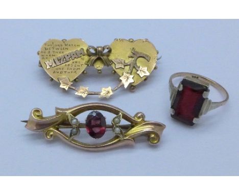 A 9ct gold and red stone ring and two 9ct gold brooches, Mizpah and one set with seed pearls and red stone, 7.3g, ring size L