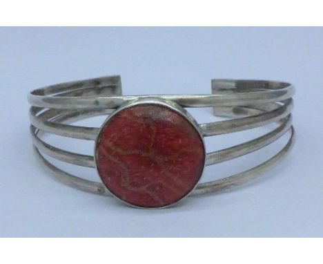 A modernist 925 silver bangle