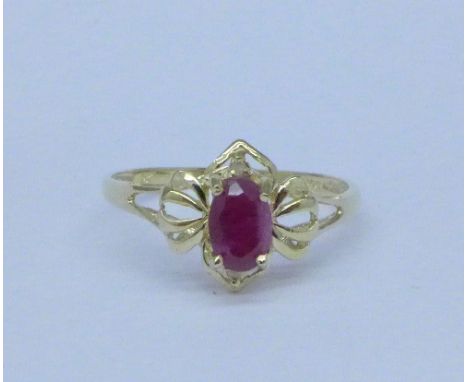 A 9ct gold, ruby and diamond ring, 1.1g, O