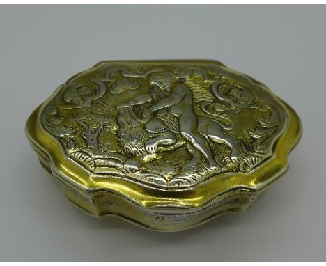 An 18th Century gilded white metal snuff box, decorated with Hercules' First Labor, The Nemean Lion, width 7.5cm