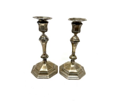 Pair of Antique silver candlestick London silver hallmarks measure approx 20cm tall filled bases 