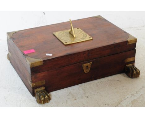 A 19th century mahogany and brass jewellery box. The mahogany box with sectional later appointed interior. The top with later