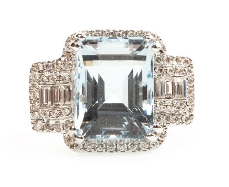 AQUAMARINE AND DIAMOND RING, the step cut aquamarine of approximately 7.00 carats, flanked by three baguette cut diamonds to 