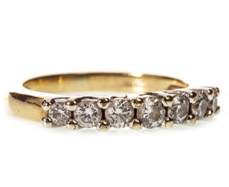 DIAMOND HALF ETERNITY RING, set with seven graduated round brilliant cut diamonds totalling approximately 0.42 carats, in nin