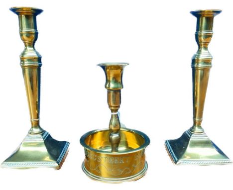 Pair of English brass 18th/ 19th century candlesticks, together with a WWI Trench art candlestick with named battle area. 
