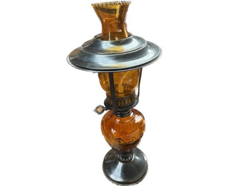 Vintage amber glass and metal made paraffin lamp.