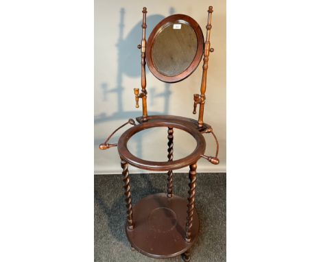 20th century wash stand fitted with a swivel mirror, two movable candle holders, shelf for razor, two towel rails to each sid