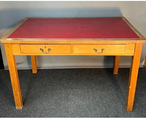 Mid 20th century Light oak and red leather topped writing desk. [77.5x122x76cm] 