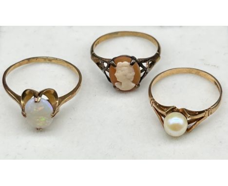 Three various 9ct yellow gold rings; Opal stones ring, Pearl ring and cameo ring. [Total weight- 4.89grams] 