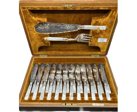 Antique oak canteen case containing a set of 12 E.P and mother of pearl handled fish knives and forks [24] fitted with Sheffi