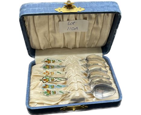 Boxed set of six sterling silver and enamel coffee spoons. 