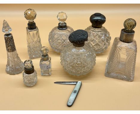 A Selection of Silver topped and collard, cut crystal perfume bottles, Together with a Birmingham silver and mother of pearl 