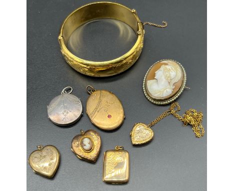 A Selection of 9ct front and back lockets, silver locket and 9ct metal core bangle. Together with a silver and carved cameo b