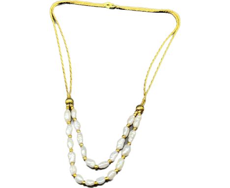 9ct yellow gold and pearl necklace. [11.20grams] 