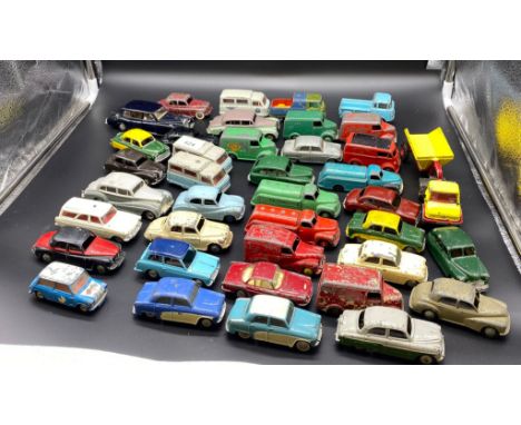A selection of playworn car models mostly Corgi and Dinky 
