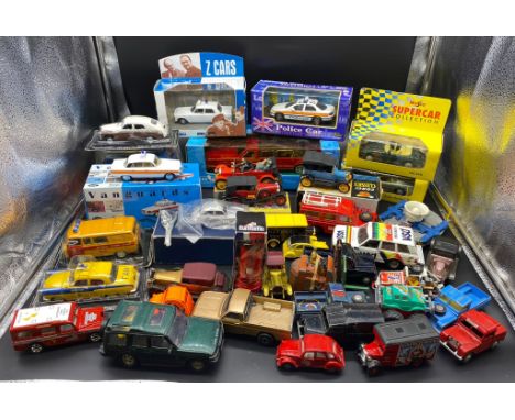 A large collection of boxed and unboxed car models to include Corgi and Dinky 