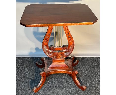 A Reproduction antique style side table; Rectangular top, Harp shaped pedestal with four out swept legs. [70x52x39cm] 