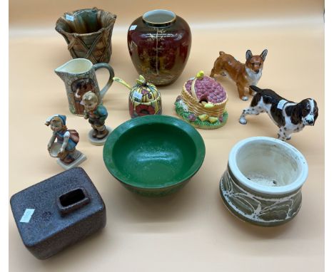 A Selection of collectable porcelain; Ikebana pottery vase, Aviemore pottery green and white studio pottery vase, Two Hummel 