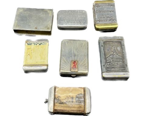 Six various souvenir vesta cases and cigarette case; McNivens rare old Highland Whiskies Glasgow vesta case, Chocolat- Menier