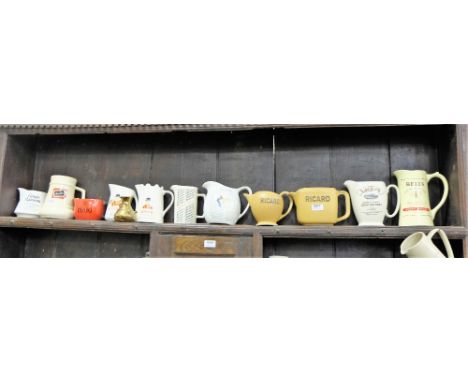 Shelf of Advertising Water Jugs – Ricard, Haig, Bells etc