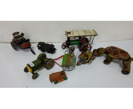 2 shelves of tin models – steam engine, carts, morbike, tractor etc (all worn)