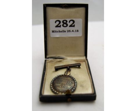 Bronze Life Saving Medal (Benevolent Association of New York, Ocber 10, 1913, awarded to M Murray) stamped Tiffany &amp; Co, 
