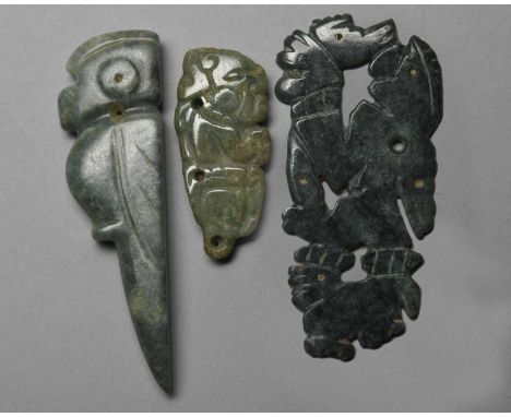 A Linea Vija figural pendantCosta Rica, circa 300 - 700 ADjade, the figure holding a staff and standing on an animal,9.2cm hi