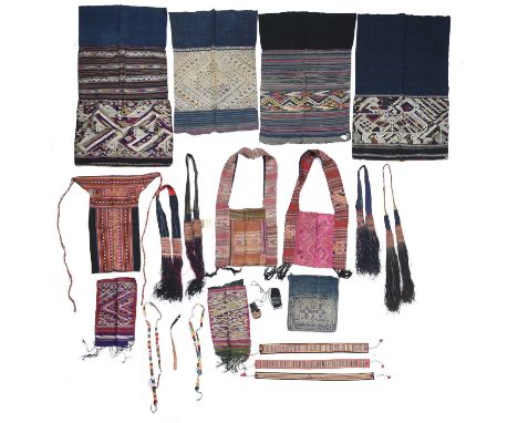 Four Laos skirts pha sinsilk and cotton, chok and kit and tapestry and chok,the largest 104cm x 60cm,two Laos bags yaam, a Hm
